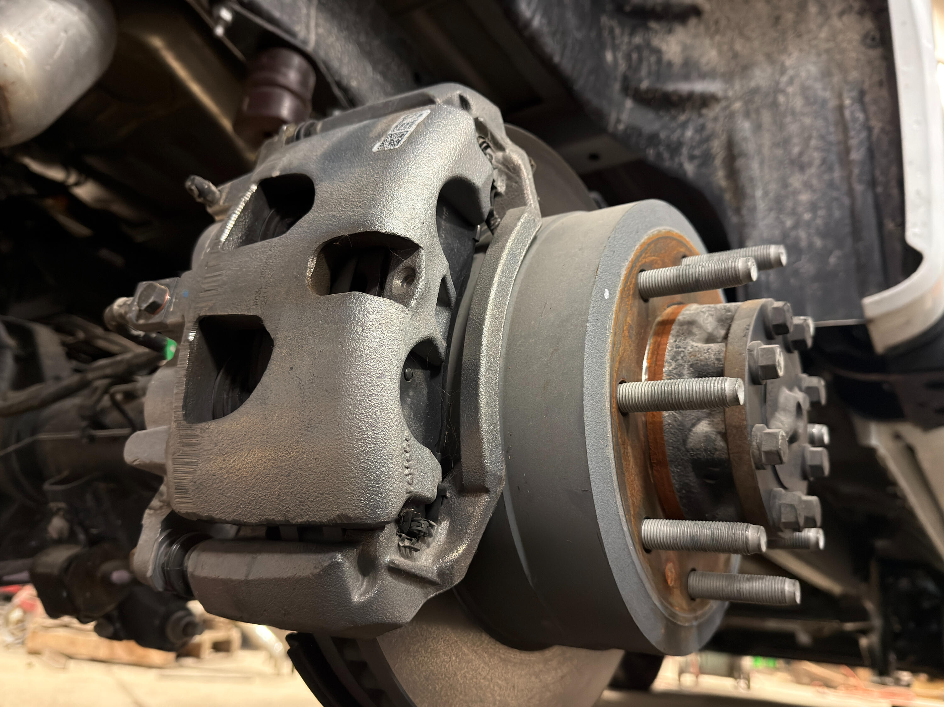 Brakes, Hubs & Bearings Service | Standard Auto Spring Works Winnipeg Heavy-duty truck brake, hub, and wheel bearing service at Standard Auto Spring Works in Winnipeg. Brake caliper, rotor, hub assembly, and wheel-end components being repaired and inspected.