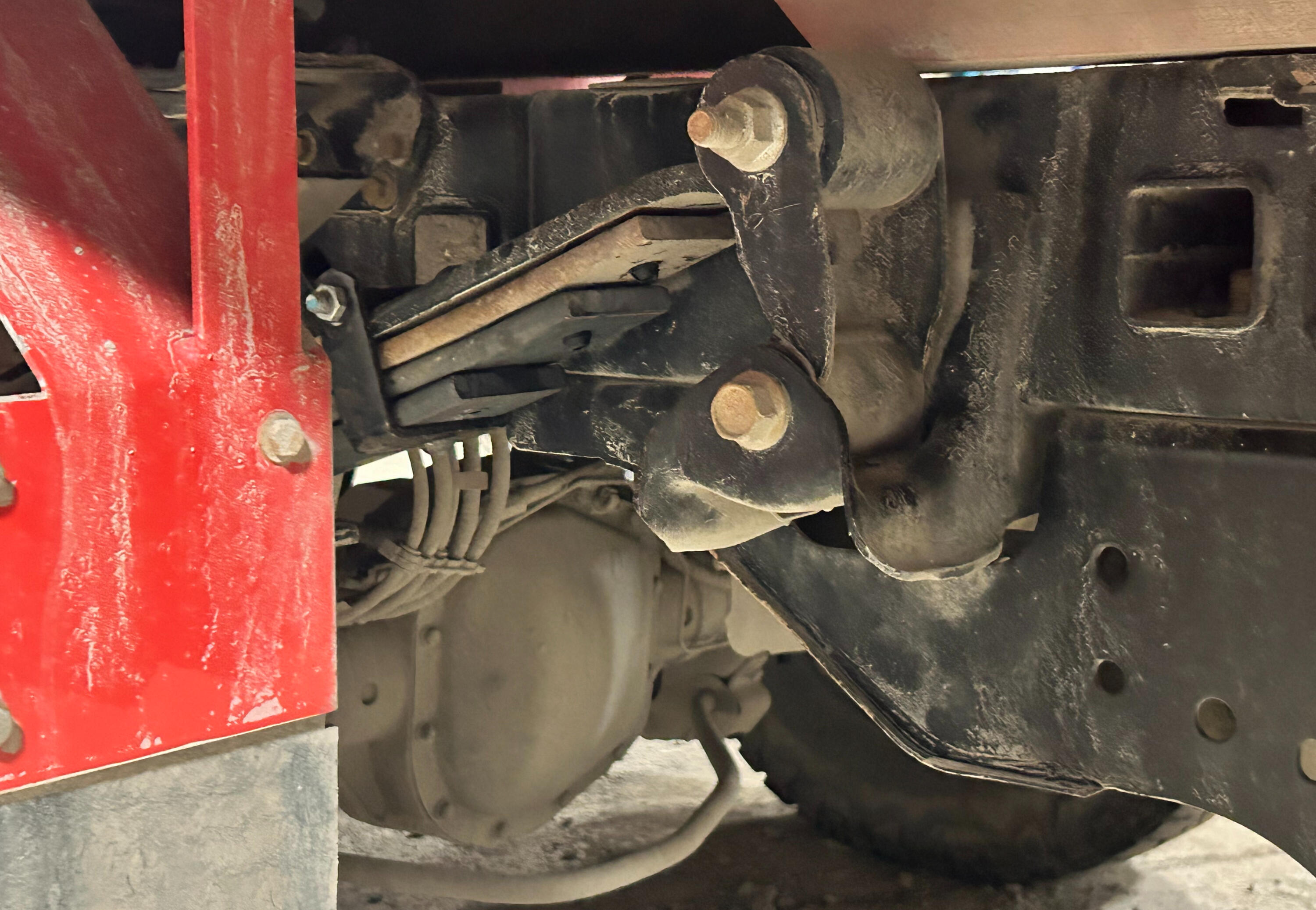 Suspension Hardware & Components | Standard Auto Spring Works Winnipeg Heavy-duty truck suspension hardware including shackles, bushings, spring hangers, mounting brackets, pins, and suspension components installed and serviced at Standard Auto Spring Works in Winnipeg.